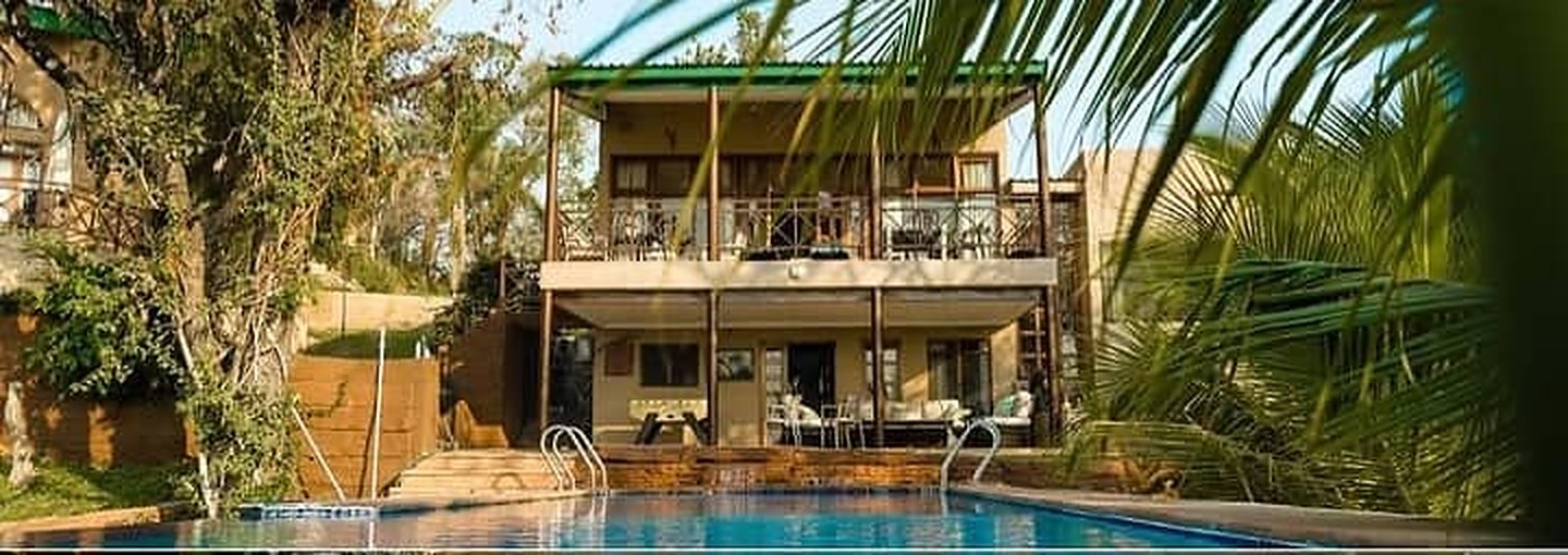 The lakehouse seen from the pool